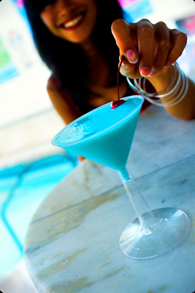 A Beautiful Smile a Blue Drink and a Blue Pool : Miami : Florida