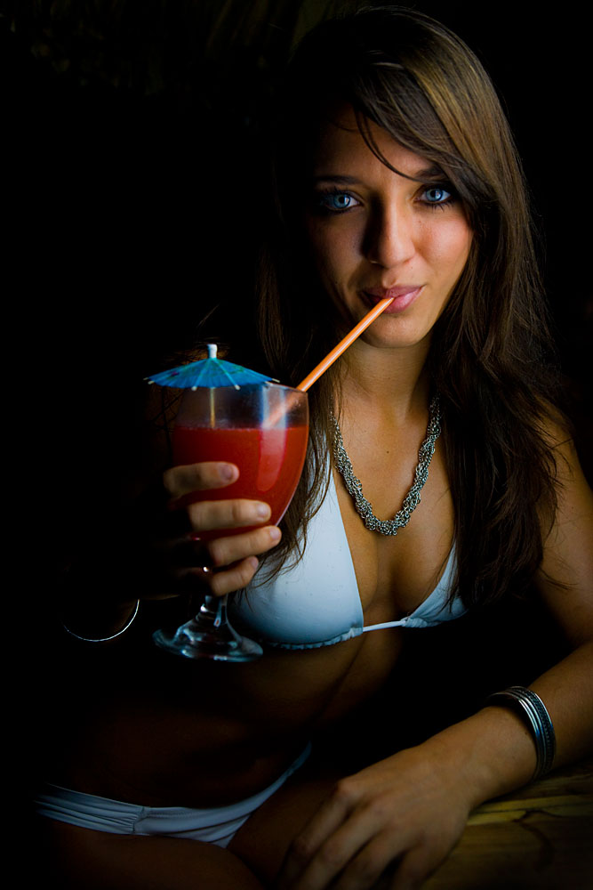 Brittany Drinking in the Tiki Bar : Maya Breeze Inn Placencia : Belize