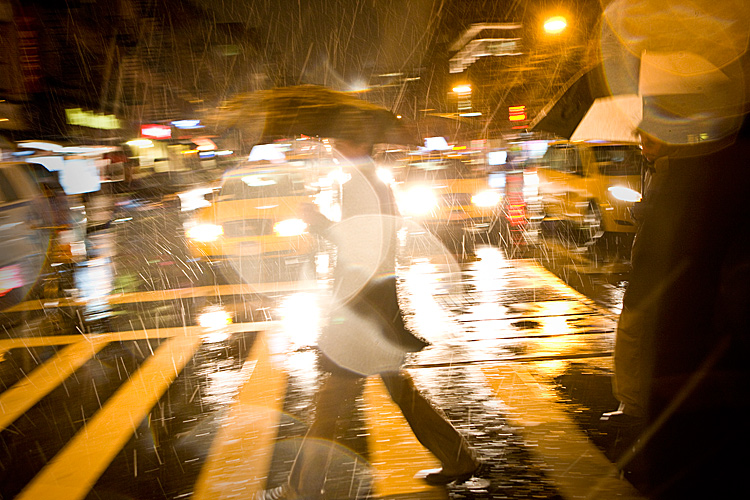 Crossing 8th Av in the Rain (with waiting Taxis) : 23rd and 8th :New York City