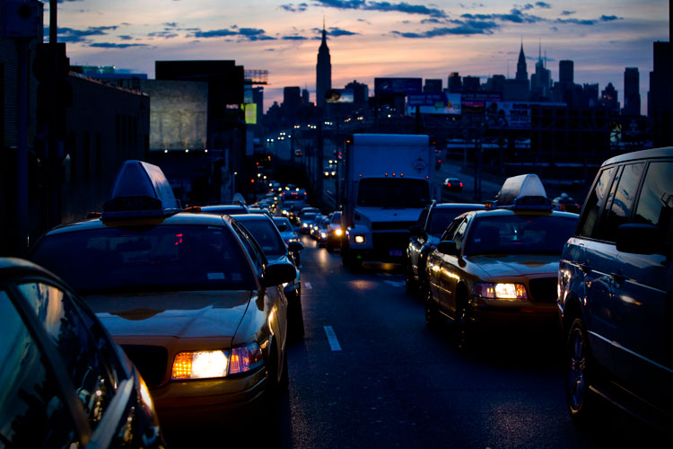 Empire State Cabs Rolling Home : Taxis In Rush Hour Traffic with Manhattan Skyline  : Queens