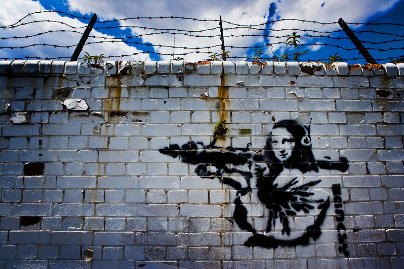 Banksy Mona Lisa with RPG : Docklands : London