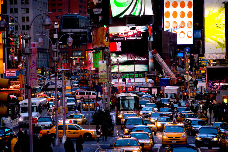 Taxi in a Sea of Traffic and Humanity : Times Sq : NYC