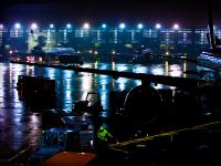 Baggage Handler in Storm : Chicago O'Hare Airport : Chicago Illinois
