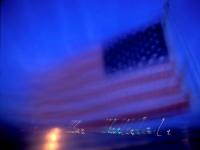 Fading US Flag flying at Guantanamo : US Naval Facility and Prison : Cuba