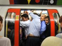 Jamming into the Tube Train : Piccadilly Circus : London