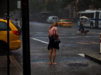 Hard to get a Taxi in the Rain : New York City : USA