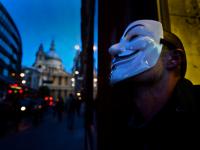 Global Crisis Personal Crisis : Homeless man Guy Fawkes Mask : City of London