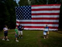 Ameicans and their Flag at a Vote Mitt Romney Event : Smokeys Shack : Morrisville : North Carolina 
