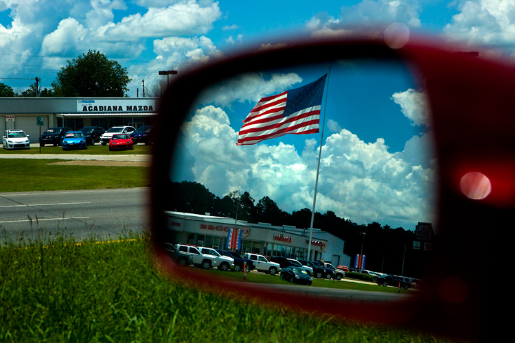 Car Culture : Flag Over Dealership Lafayette : Louisiana