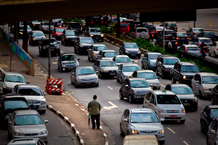 Lone Man Against Sea of Traffic : Sao Paulo : Brazil